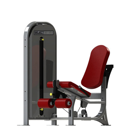 Gym fitness machine with red pads and a gray frame on a white background