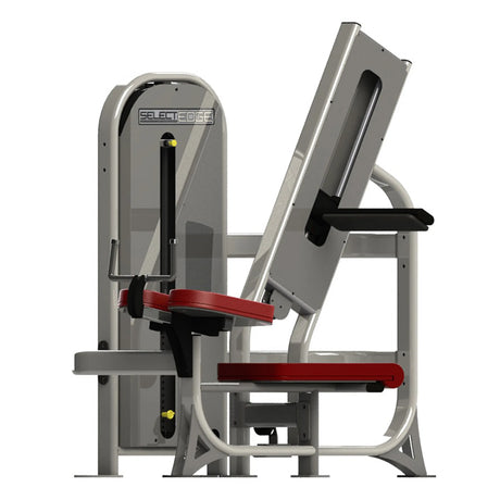 Gym fitness machine with red pads and a gray frame on a white background