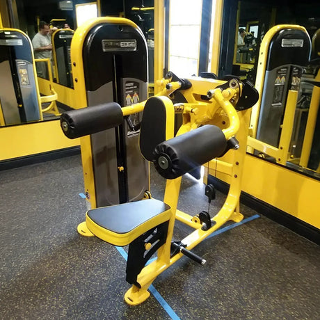 Yellow and black gym machine in a fitness center