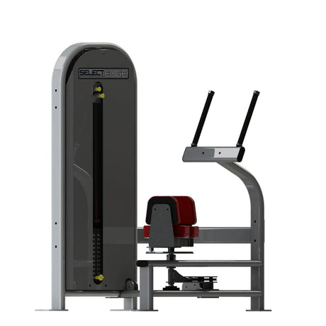 Gym machine with red seat and gray frame on a white background