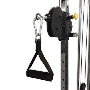 Black D grip handle on a black pulley on a piece of gym equipment with a white background