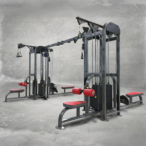 Gym equipment with red padding on a gray floor and background