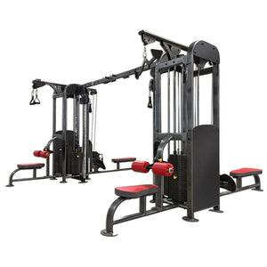 Gym machine with red padding on a white background