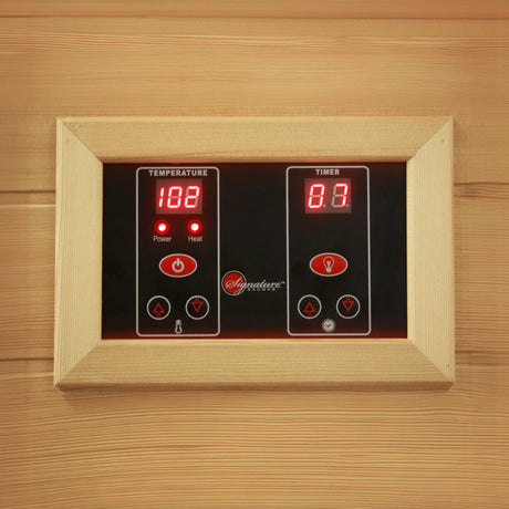 Exterior LED controls on the side of a wooden Canadian hemlock sauna
