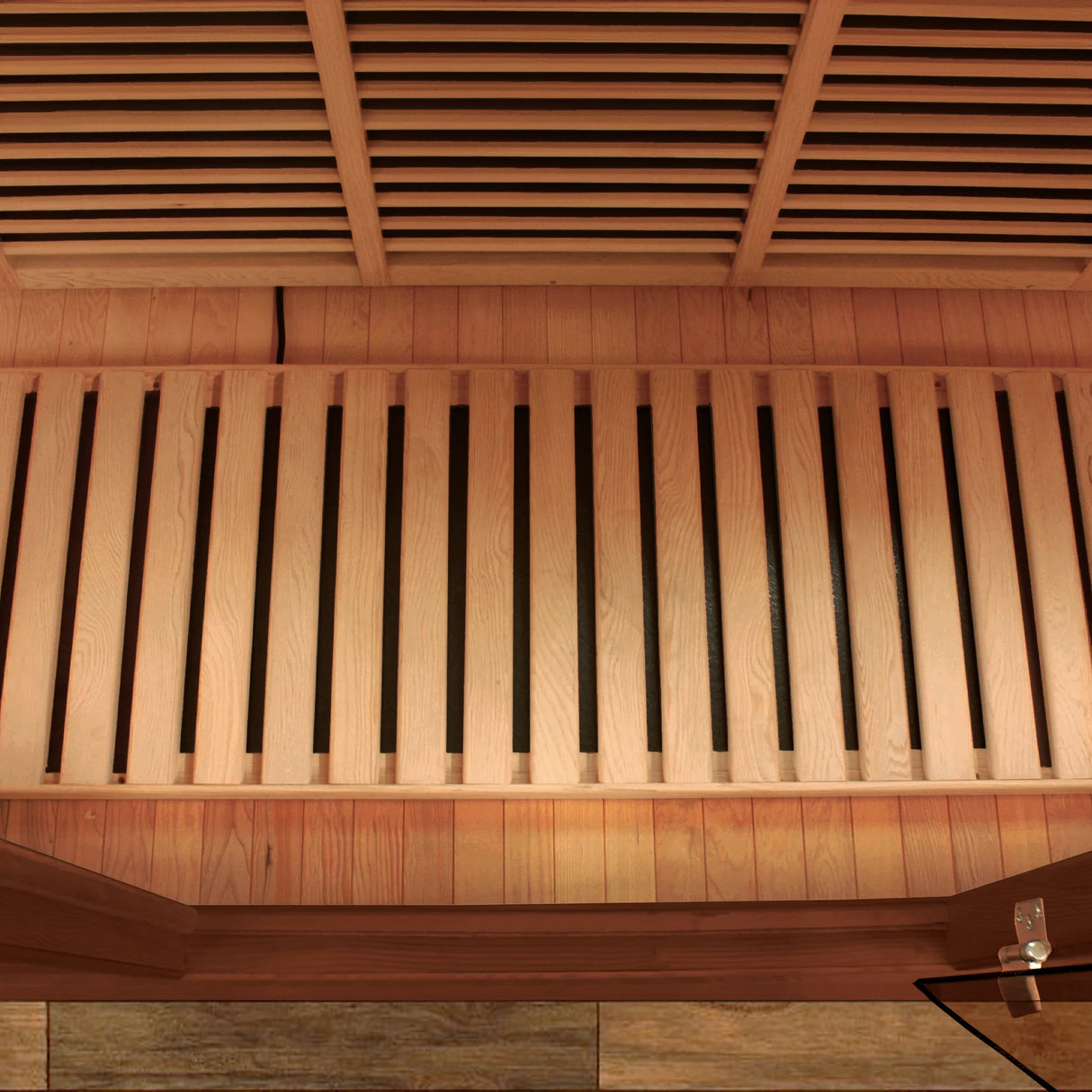 The interior bench in a Maxxus Saunas FAR infrared Balmain model sauna constructed from Canadian red cedar with a three person capacity