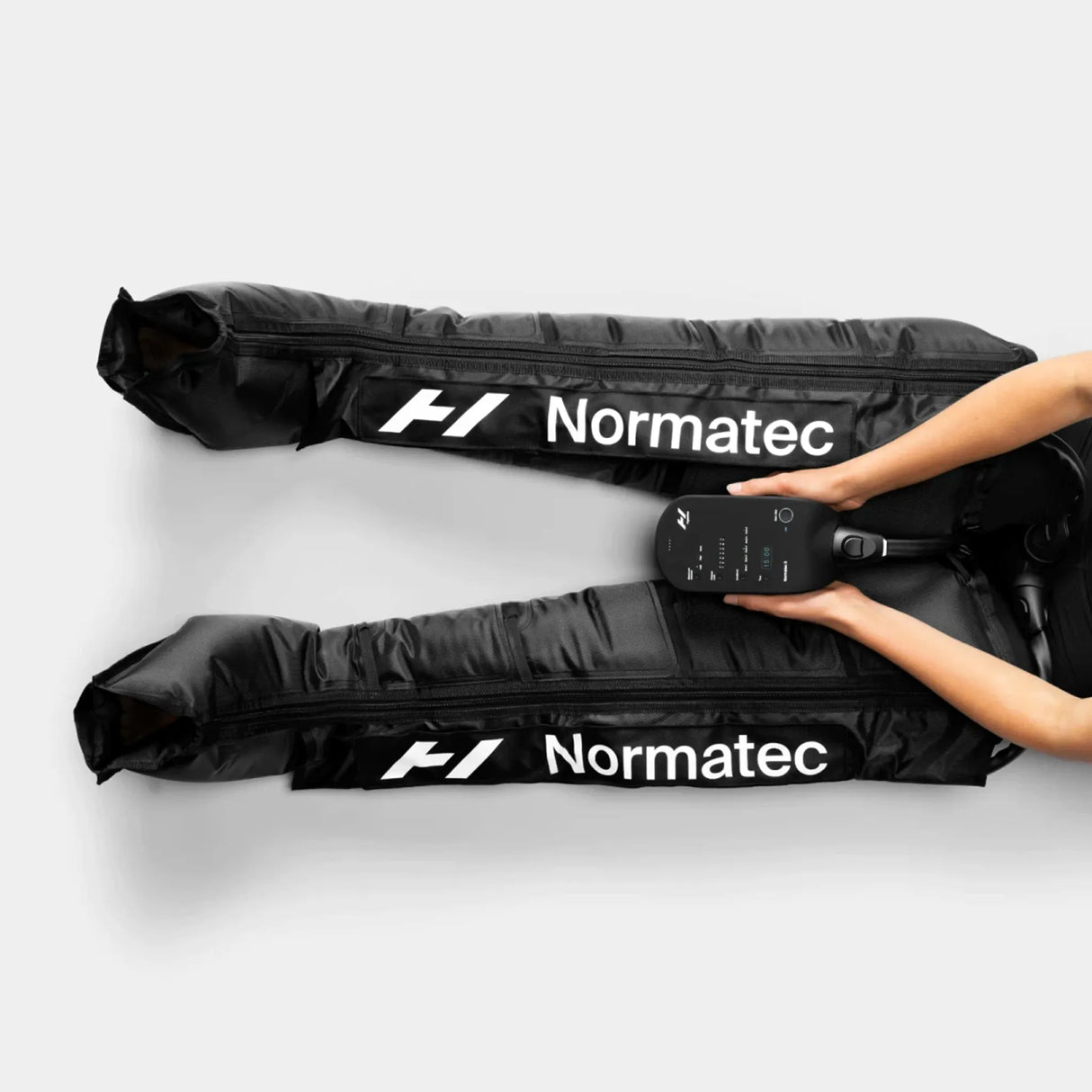Inflatable compression wearable leggings made by Normatec to provide users with increased circulation, decreased pain, quicker recovery from sports, and massage