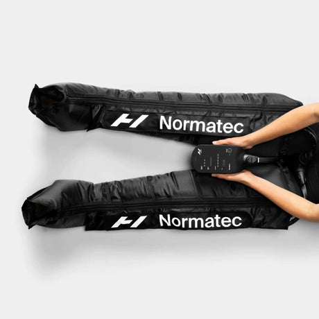 Inflatable compression wearable leggings made by Normatec to provide users with increased circulation, decreased pain, quicker recovery from sports, and massage