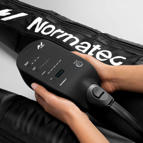 Inflatable compression wearable leggings made by Normatec to provide users with increased circulation, decreased pain, quicker recovery from sports, and massage