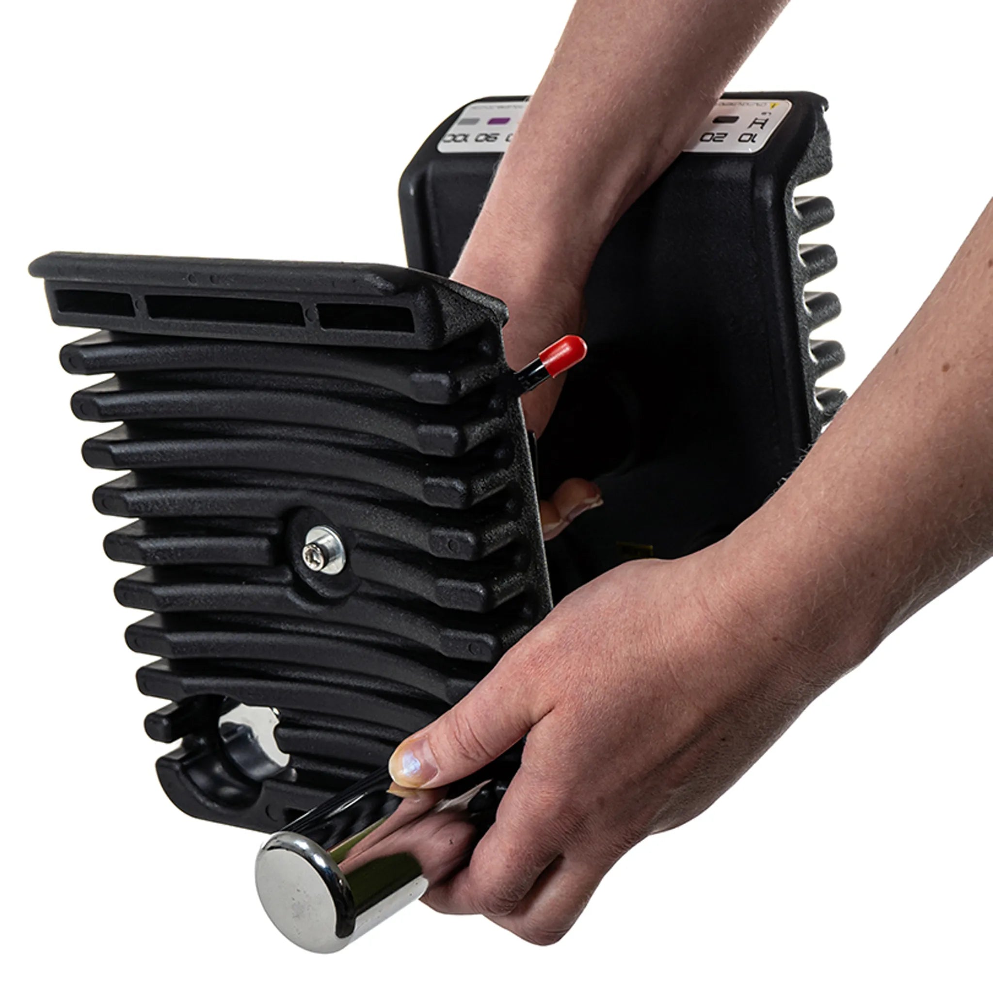 Someone holding the handle for a PowerBlock Pro 100 Expandable Dumbbell