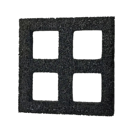 The ECORE Quad Blok Connector for 1" Tiles by ECORE Athletic is a black rubber mat with four large square openings in a 2x2 grid, featuring a textured surface, shown isolated on a white background.