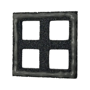 The ECORE Athletic Quad Blok Connector for 1" Tiles features a black, textured square design with four equal rectangular cutouts in a two-by-two grid and a shiny gray border outlining each cutout and the edges.