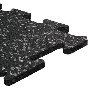 Close-up of ECORE Rubber Floor Tiles - 8mm Interlocking by ECORE Athletic, featuring a black tile with gray speckles, textured surface, and puzzle-like edges, shown isolated on a white background.