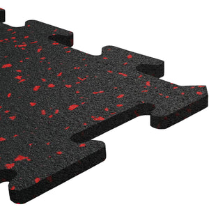 Close-up of ECORE Athletic’s ECORE Rubber Floor Tiles - 8mm Interlocking in black with red speckles, highlighting the textured surface and puzzle-piece edges for seamless connection with other tiles.