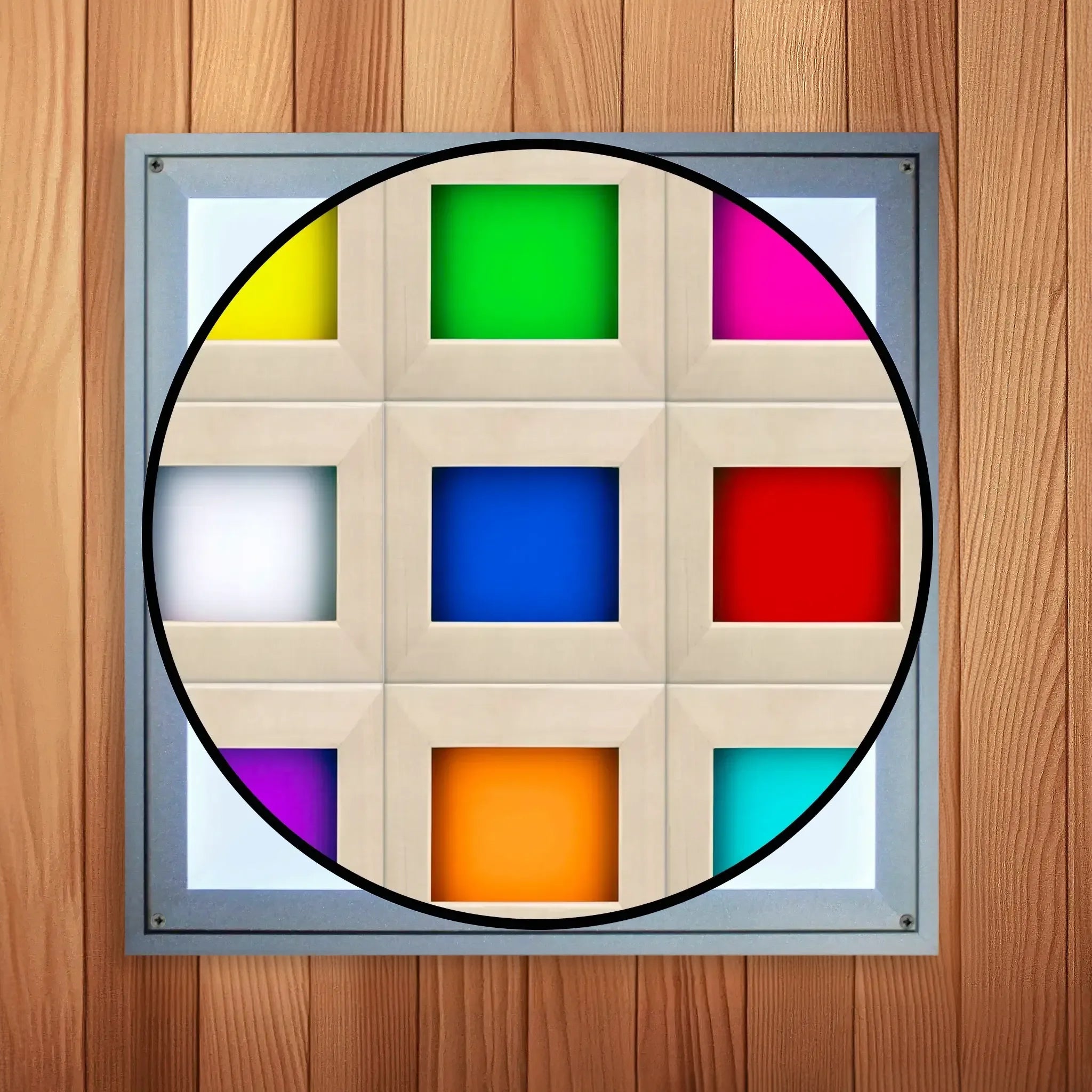 Chromotherapy lighting panel cover which is white and found inside of a wooden sauna with a cutout revealing the colors underneath which the light can display including yellow, lime, pink, white, blue, aqua, red, purple, and orange