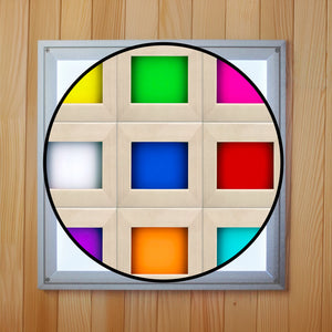 Image of an overhead chromotherapy light in a sauna which is square and bright with 9 colored lights underneath the cover