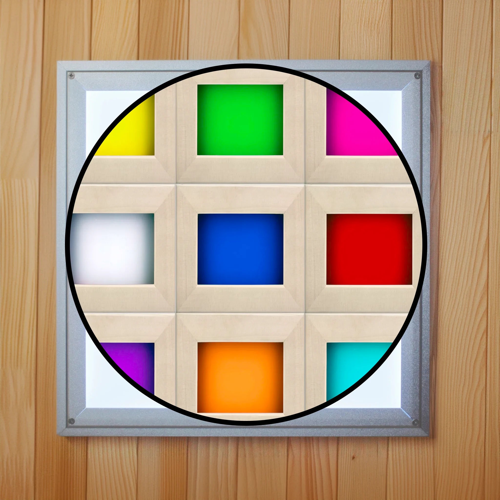 Overhead chromotherapy lighting light found inside of a wooden sauna which shows the nine colors produce by the light which include yellow, green, magenta, white, dark blue, red, light blue, purple, and orange