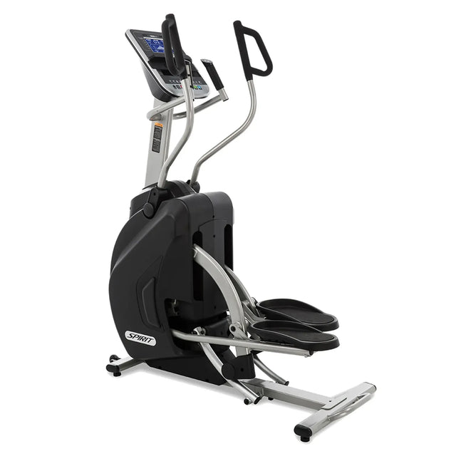 The Spirit Fitness XS895 Adjustable Incline HIIT Stepper by Spirit Fitness features a digital display, black and silver frame, large foot pedals, and moving handlebars for a modern full-body workout.
