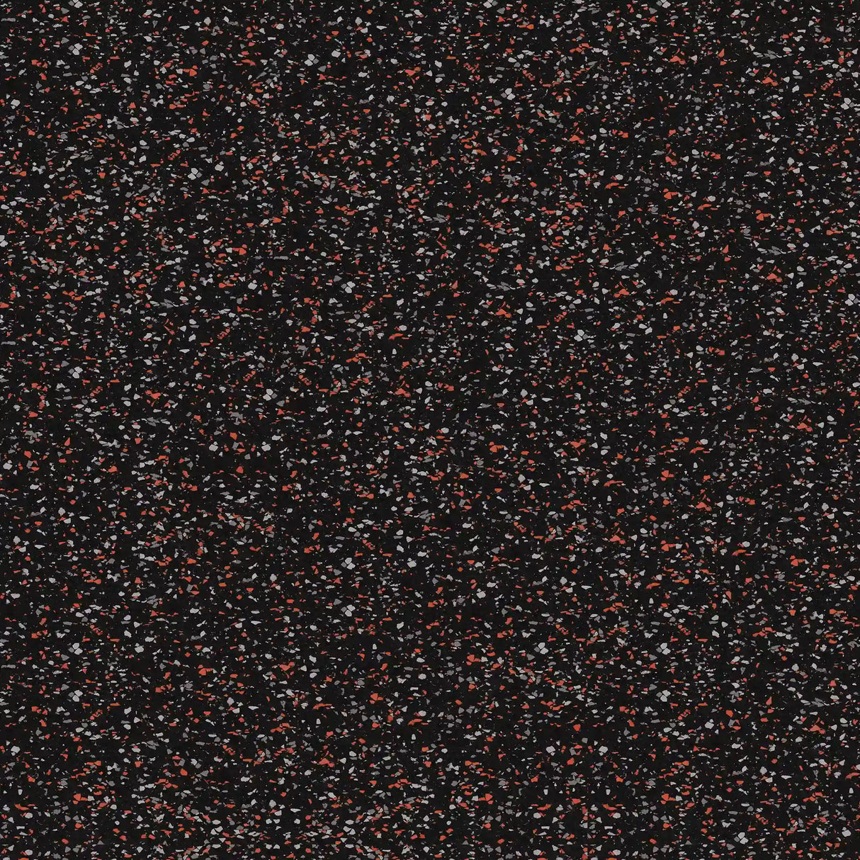 A close-up of ECORE Athletic’s ECORE Rubber Floor Tiles - 8mm Interlocking shows a black speckled surface with red, white, and gray flecks, resembling high-quality rubber gym flooring.