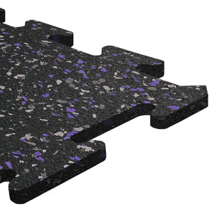 A close-up of the ECORE Athletic ECORE Rubber Floor Tiles - 8mm Interlocking, featuring black tiles with gray and purple speckles and puzzle-like edges.