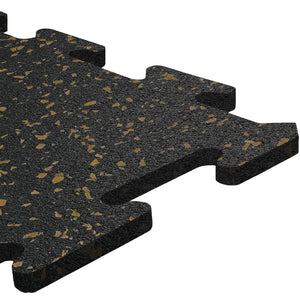 A close-up of an ECORE Athletic Rubber Floor Tile - 8mm Interlocking, black with yellow speckles and zigzag edges for easy connection. The background is white.