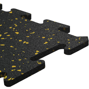 Close-up of ECORE Rubber Floor Tiles - 8mm Interlocking by ECORE Athletic, featuring black tiles with yellow speckles, textured surfaces, and puzzle-like edges designed for easy flooring installation.