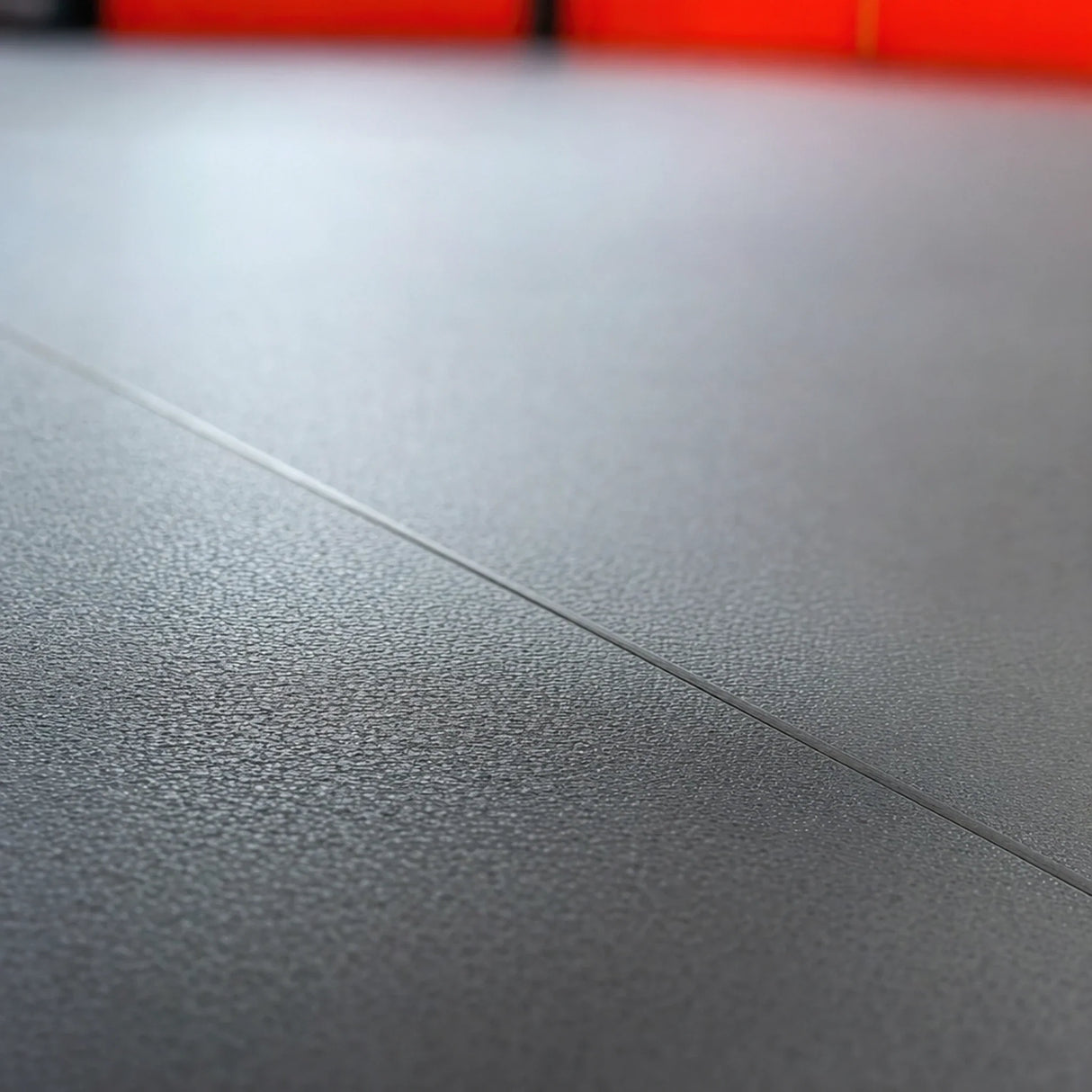 Finished heat-welded seam after ECORE Serenity Motivate Weld Rod was welded in and trimmed flush with the floor