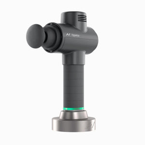 Percussion massage gun charging stand by Hyperice