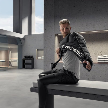 Inflatable compression wearable arm sleeves made by Normatec to provide users with increased circulation, decreased pain, quicker recovery from sports, and massage