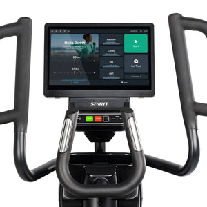 Close-up of the Spirit Fitness CE1000ENT Elliptical console displays the Hello Guest screen with age and weight sliders, Fatburn, Cardio, Hill, and HIIT workout options, and a green Start button. Brand: Spirit Fitness.