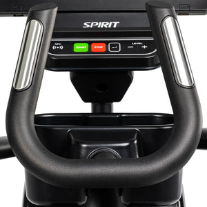 Close-up of the Spirit Fitness CE1000ENT Elliptical control panel shows the Spirit nameplate, Start and Stop buttons, Level adjustment controls, and the handlebar grips on either side.