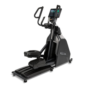 Front-left angled view of the Spirit Fitness CE1000ENT Elliptical showing the moving handlebars, tiltable console, cushioned foot platforms, and black frame with Spirit branding on the shroud.