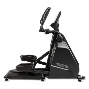Right side profile of the Spirit Fitness CE1000ENT Elliptical showing the full elliptical stride path, console arm, handlebar loop, and Spirit logo on the shroud, on a white background.