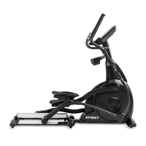 The Spirit Fitness CE800ENT Elliptical is a black exercise machine with a digital display, foot pedals, and moving handlebars, shown from the side on a white background.