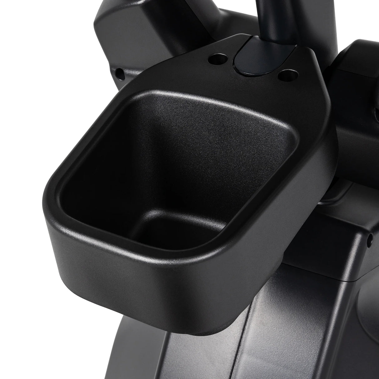 Close-up of a black plastic cup holder attached to the Spirit Fitness CE850 Elliptical by Spirit Fitness, designed to securely hold a water bottle or other small items during your workout.