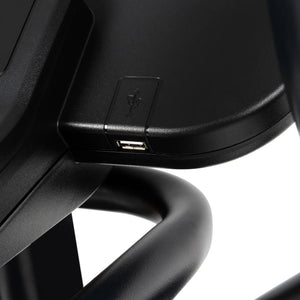 Close-up of the Spirit Fitness CE850 Elliptical by Spirit Fitness, featuring a built-in USB port for convenient device charging, with curved metal bars visible beneath its surface.