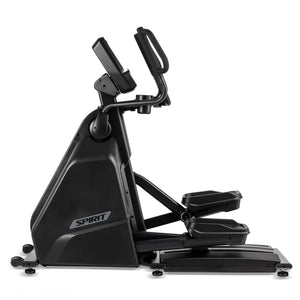 A side view of the Spirit Fitness CE900 Elliptical by Spirit Fitness, a black indoor cardio machine featuring a digital display, large handles, and foot pedals.