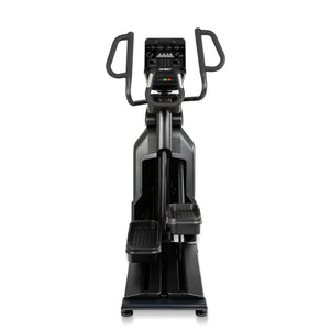 The Spirit Fitness CE900 Elliptical by Spirit Fitness features a black design and digital display showing time, distance, calories, and heart rate.