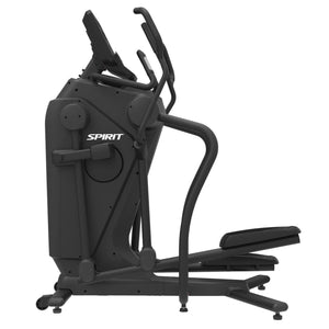 The Spirit Fitness CES880 Suspension Elliptical is a sturdy black cardio machine with handles, foot pedals, and a digital display. Shown from the side, its modern design by Spirit Fitness is ideal for indoor workouts.