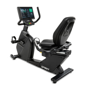 The Spirit Fitness CR1000ENT Recumbent Bike by Spirit Fitness features a large touchscreen console, a reclined seat with backrest, side handlebars, and a low step-through frame in black, displayed on a white background.