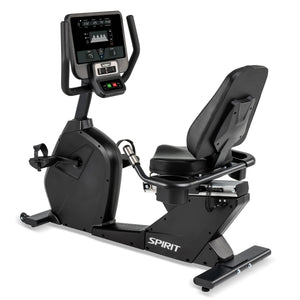 The Spirit Fitness CR800 Recumbent Bike is a black exercise bike featuring a digital display, handlebars, cushioned seat with backrest, and pedals. The Spirit Fitness brand name appears on the lower frame.