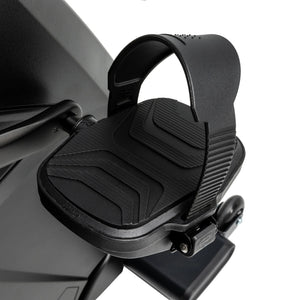 Close-up of a black pedal with adjustable strap and textured footpad on the Spirit Fitness CR800ENT Recumbent Bike by Spirit Fitness, attached to its black frame, set against a white background.