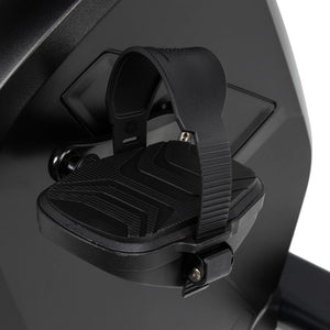 Close-up of a black pedal with adjustable textured strap on the Spirit Fitness CR900 Recumbent Bike by Spirit Fitness. The pedal features a non-slip rubber surface for secure grip while cycling.