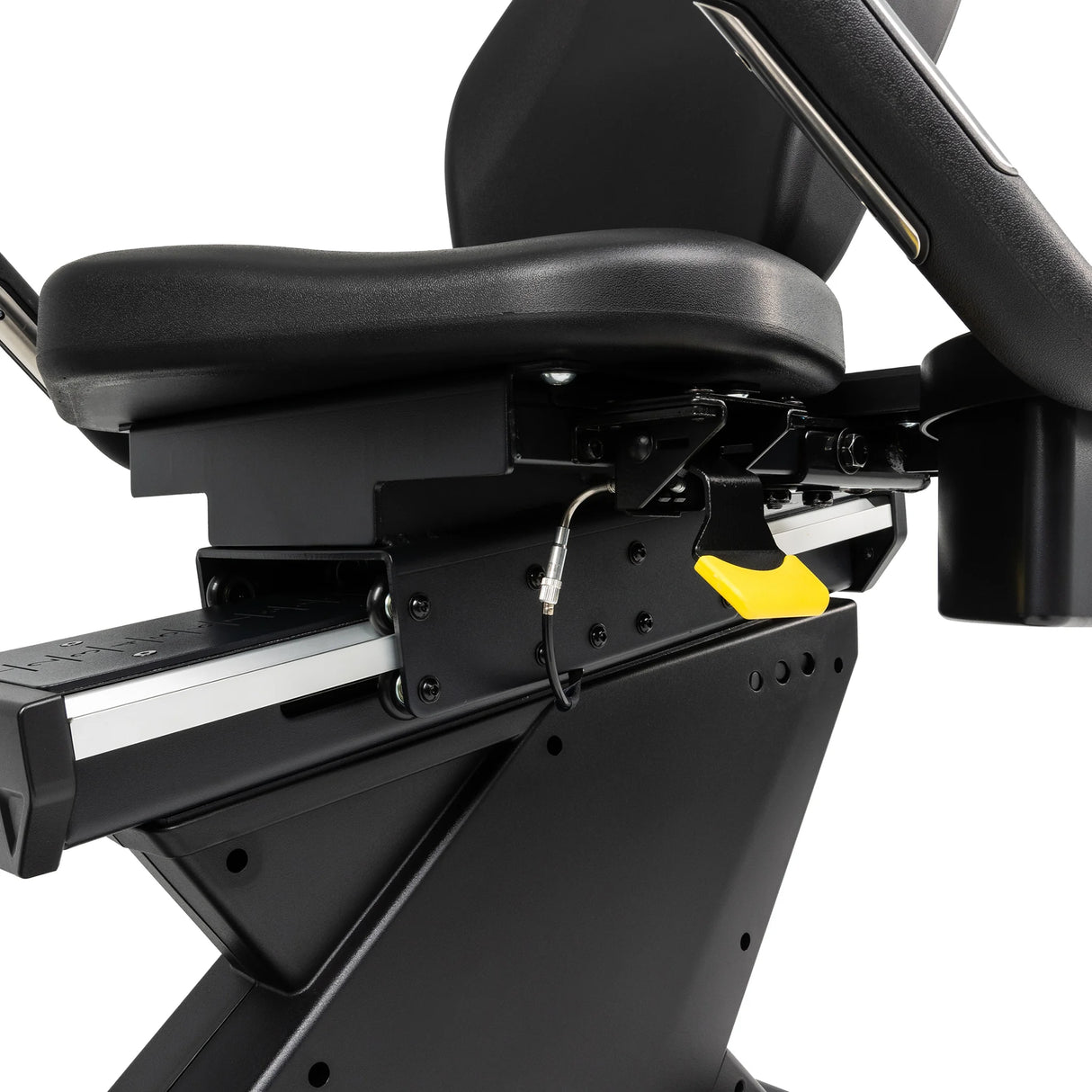 Close-up view of the Spirit Fitness CR900 Recumbent Bike by Spirit Fitness, featuring a black seat with armrests, a yellow adjustment lever, and a sliding track for precise seat positioning.