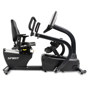 The Spirit Fitness CRS800S Recumbent Seated Stepper by Spirit Fitness is shown from the side against a white background, featuring a seat, backrest, two handles, and foot pedals in black.