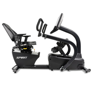 The Spirit Fitness CRS800S Recumbent Seated Stepper by Spirit Fitness in black features a padded seat with backrest, adjustable handlebars, strapped foot pedals, and a large display console, displayed on a white background.