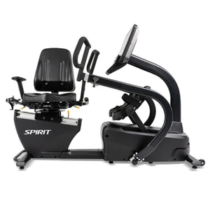 The Spirit Fitness CRS800S Recumbent Seated Stepper is a black recumbent stepper with a large seat, adjustable armrests, and a digital display monitor, labeled "SPIRIT" on the side.