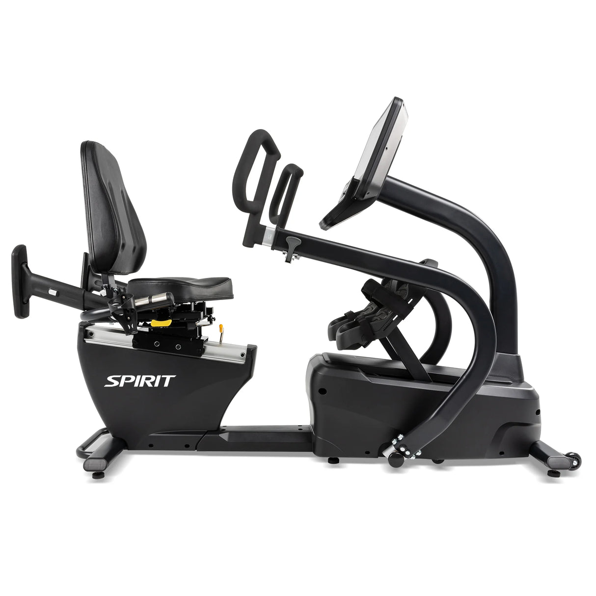 The Spirit Fitness CRS800S Recumbent Seated Stepper is a black exercise bike with a large cushioned seat, backrest, handlebars, pedal straps, and a digital display screen.