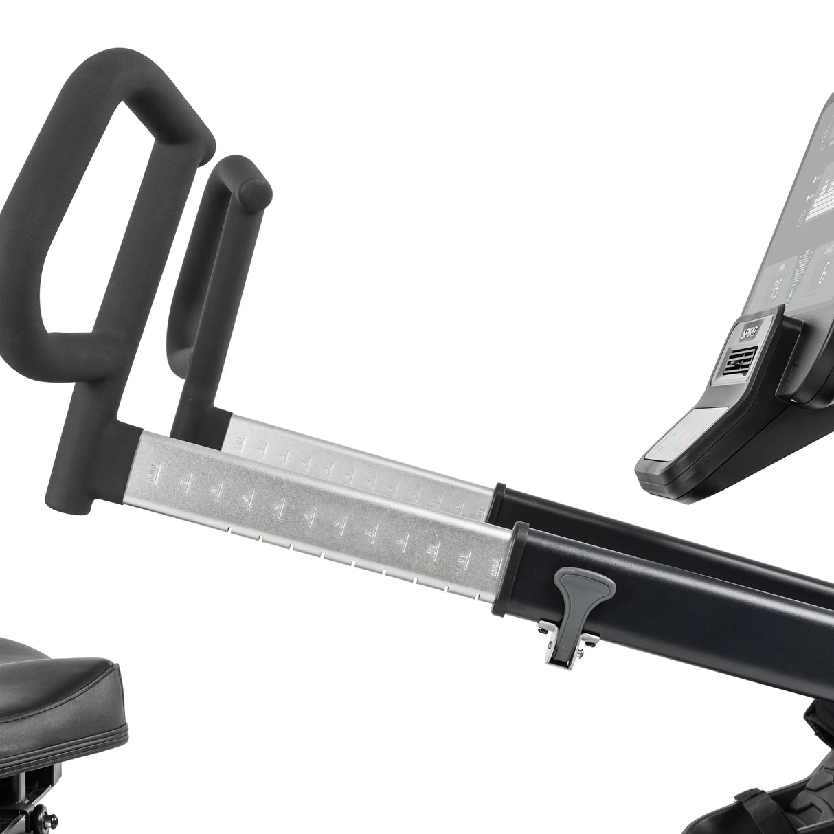Close-up of the Spirit Fitness CRS800S Recumbent Seated Stepper’s foam-padded adjustable handlebars and digital display. Measurement markings are visible on the metal adjustment bar, along with part of the seat and control screen by Spirit Fitness.
