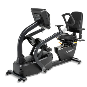 The Spirit Fitness CRS800S Recumbent Seated Stepper by Spirit Fitness is a black exercise bike with a large digital display, adjustable seat, handlebars, and foot pedals. The bike features the SPIRIT logo on its side.