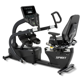 The Spirit Fitness CRS800S Recumbent Seated Stepper features a large digital display, adjustable seat with backrest, and foot pedals with straps.